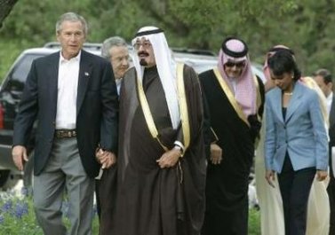 U.S. President George W. Bush walks arm in arm with Saudi Crown Prince Abdullah at Bush's ranch in Texas. Source: Reuters.